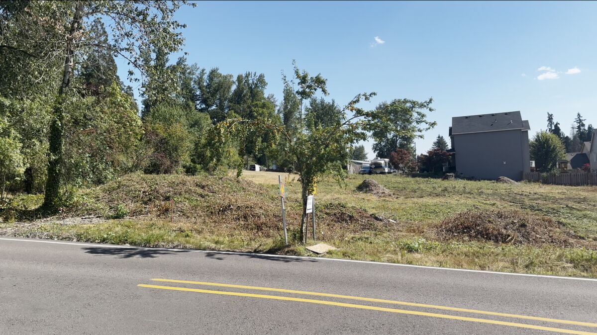 Frontage at the marker stake on the property line.