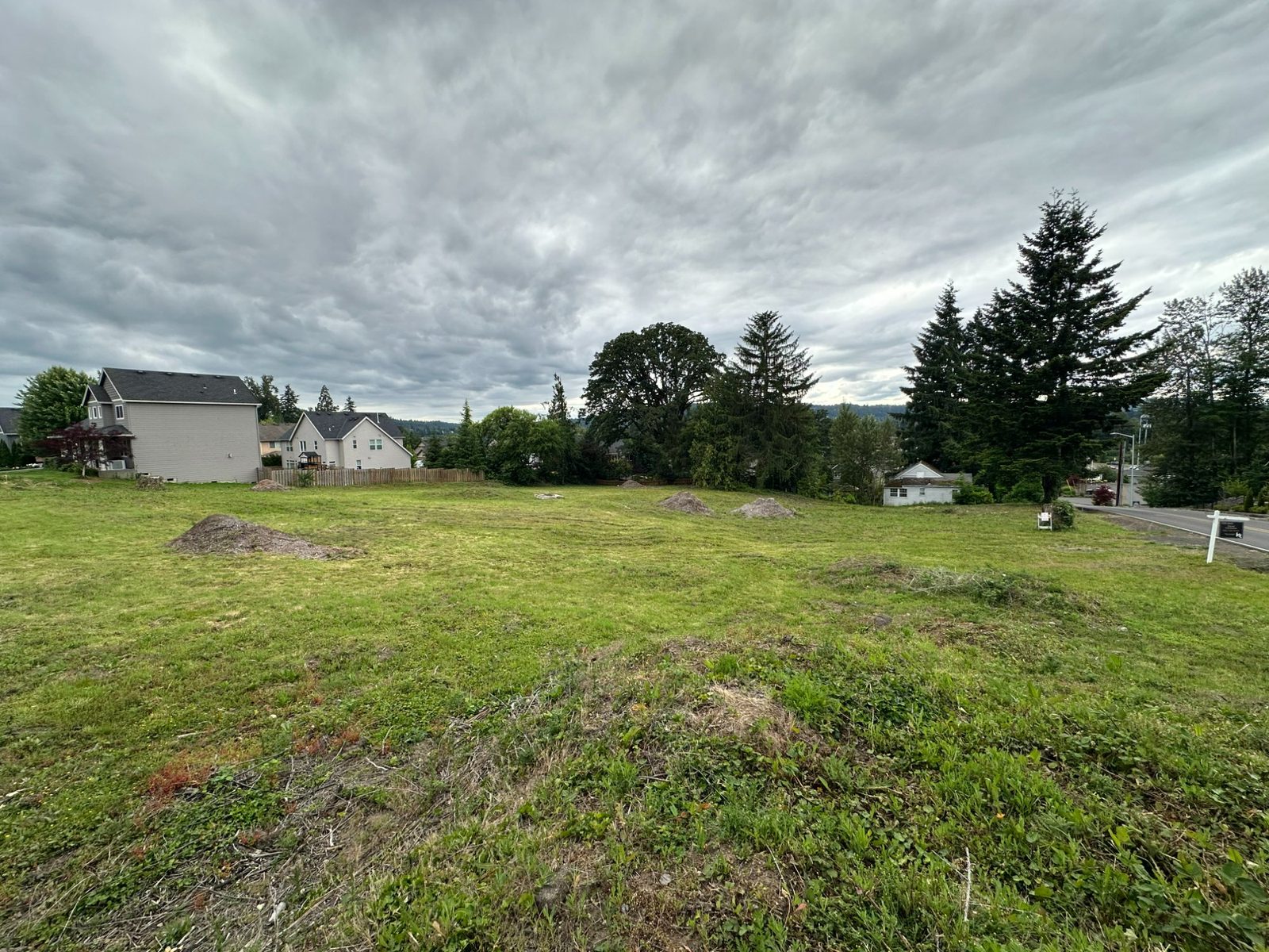 The lot cleared and stumped, looking north toward Forsythe Road.