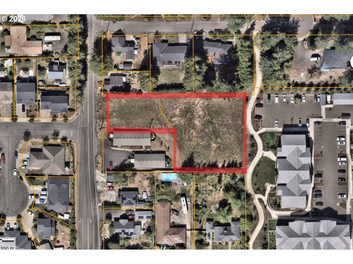 The site outlined from above. The parcel runs back from NW Birdsdale Avenue on a flag shaped lot.